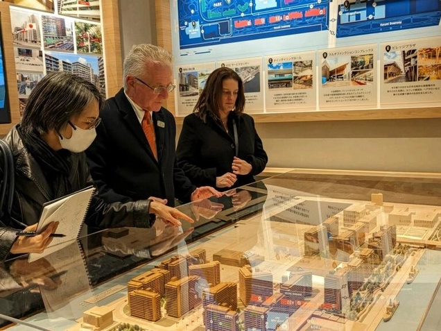 (Council President Krekorian and Councilmember Yaroslavsky examine model of Tokyo's Olympic Village, now being converted to housing and other public uses.)